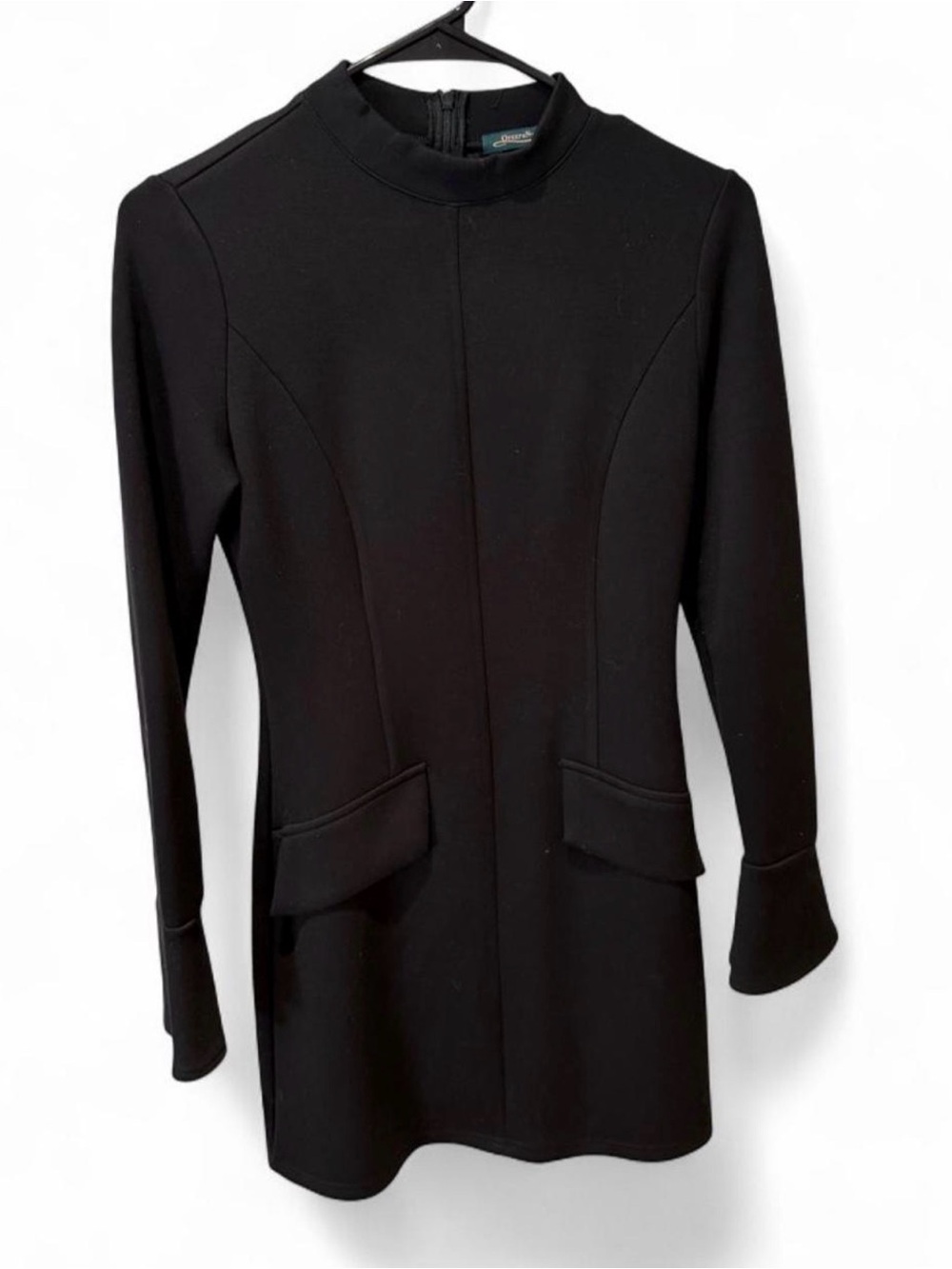Sleek Black Long-Sleeve Mini Dress with Flap Pockets